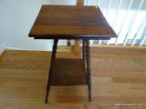 (UPHALL) ANTIQUE OAK TABLE WITH 1 LOWER SHELF AND TURNED LEGS. MEASURES 18 IN X 18 IN X 30 IN. ITEM