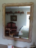 (UPBED 2) DISTRESSED AND GOLD TONE FINISH FRAMED MIRROR. MEASURES 29 IN X 35 IN. ITEM IS SOLD AS IS