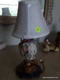 (UPBED 2) SMALL DECORATIVE PORCELAIN LAMP WITH SHADE. MEASURES 12 IN TALL. ITEM IS SOLD AS IS WHERE