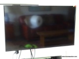 (DLR) VIZIO 42 IN FLAT SCREEN TV. IS WALL MOUNTED. IS IN WORKING CONDITION. ITEM IS SOLD AS IS WHERE