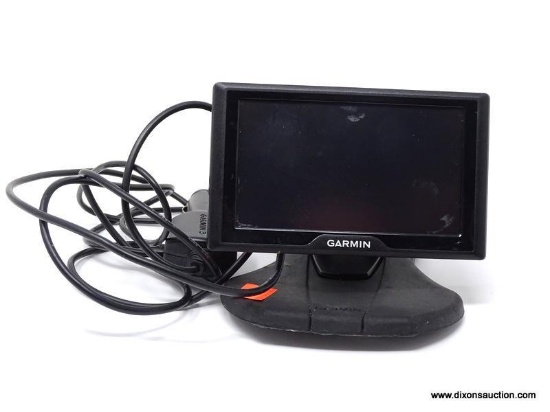 (SC) GARMIN GPS SYSTEM WITH POWER CORD AND STAND. ITEM IS SOLD AS IS, WHERE IS, WITH NO GUARANTEE OR