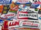 (S4D) HUGE LOT OF VINYL AUTOMOBILIA ADVERTISING DECALS INCLUDING: CHAMPION SPARK PLUGS; NGK; PIONEER