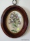 (APTLR) ANTIQUE WALNUT OVAL FRAME WITH FLORAL PRINT- 11 IN X 14 IN, ITEM IS SOLD AS IS WHERE IS WITH