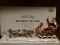 (3RD FL) DEPT. 56 SNOW VILLAGE- SNOW CARNIVAL AND QUEEN- 8 IN X 4 IN, ITEM IS SOLD AS IS WHERE IS