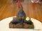 (PARLOR) GNOME FIGURINE- TANK- WITH STORY ABOUT THE FIGURE- 6 IN X 6 IN, ITEM IS SOLD AS IS WHERE IS