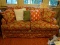 (LIBRARY) FLORAL UPHOLSTERED SOFA- 74 IN X 33 IN X 35 IN, ITEM IS SOLD AS IS WHERE IS WITH NO