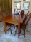 (BCKRM) CHERRY TOM SEELY TABLE WITH DRAWER AND 4 WINDSOR BACK CHAIRS- TABLE- 60 IN X 34 IN X 29.5