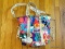 (DR) MULTI-COLORED LADIES COACH HAND BAG/POCKET BOOK. ITEM IS SOLD AS IS WHERE IS WITH NO GUARANTEES