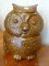 (BCK RM) MCCOY POTTERY #204 OWL SHAPED COOKIE JAR WITH LID. IS BROWN IN COLOR AND MADE IN THE USA.