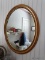 (UPBD2) OVAL MAPLE MIRROR- 26 IN X 32 IN, ITEM IS SOLD AS IS WHERE IS WITH NO GUARANTEES OR