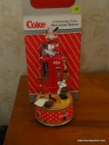 (UPHALL) COKE MINI ACTION MUSIC BOX IN ORIGINAL BOX- 7 IN- DATED 1995, ITEM IS SOLD AS IS WHERE IS