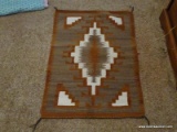 (APTLR) HANDWOVEN NAVAJO RUG, PURCHASED IN NEW MEXICO- 28 IN X 30 IN,ITEM IS SOLD AS IS WHERE IS