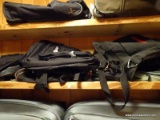 (3RD FL) SHELF LOT OF CARRY ON BAGS AND BACKPACKS, ITEM IS SOLD AS IS WHERE IS WITH NO GUARANTEES OR