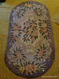 ( 3RD FL) OVAL HOOK RUG- 29 IN X 57 IN, ITEM IS SOLD AS IS WHERE IS WITH NO GUARANTEES OR WARRANTY.