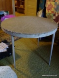 (3RD FL) ROUND FOLDING CARD TABLE- 33 IN X 27 IN, ITEM IS SOLD AS IS WHERE IS WITH NO GUARANTEES OR