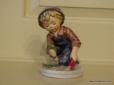 (PARLOR) GOEBEL FIGURINE- BOY PLANTING BULBS- 1978- W. GERMANY- 5 IN H, ITEM IS SOLD AS IS WHERE IS