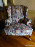 (HALL) CHERRY BALL AND CLAW WING CHAIR BY BROYHILL WITH FLORAL UPHOLSTERY- 35 IN X 28 IN X 45