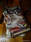 (DR) STACK OF LEISURE ARTS BOOKLETS. APPROXIMATE TOTAL OF 15 - 20. ITEM IS SOLD AS IS WHERE IS WITH