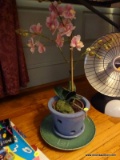 (DR) 2 PIECE LOT TO INCLUDE A PLANTER WITH ARTIFICIAL ORCHID, AND A GREEN PAINTED PLATTER. ITEM IS