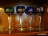 (DR) SET OF 4 BOHEMIAN CUT TO THE CLEAR GOBLETS IN GREEN, PURPLE, BLUE, AND BLACK. ITEM IS SOLD AS