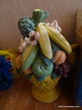 (BCK HALL) CONCRETE STATUE OF A BASKET FILLED WITH FRUIT. MEASURES 13 IN X 18 IN. ITEM IS SOLD AS IS