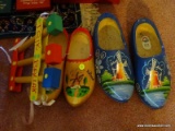 (UPBD1) 2 PR OF WOODEN DUTCH PAINTED SHOES AND A GERMAN MUSICAL TOY, ITEM IS SOLD AS IS WHERE IS