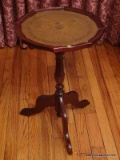 (LR) VINTAGE MAHOGANY LEATHER TOP CANDLE STAND WITH PIE CRUST TOP- VERY GOOD CONDITION- 13.5 IN X 22