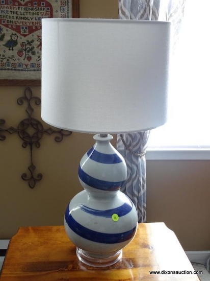 (LR) BLUE AND WHITE STRIPED DECORATIVE GLASS LAMP- WITH SHADE- 26 IN H, ITEM IS SOLD AS IS WHERE IS