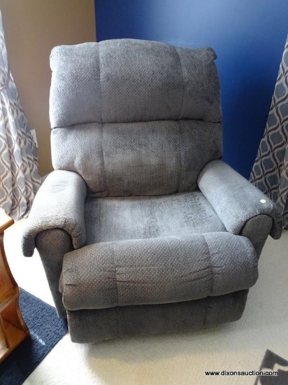 (LR) ONE OF A PR. OF GRAY UPHOLSTERED RECLINERS- SHOWS WEAR IN THE SEAT- 36 IN X 32 IN X 40 IN, ITEM