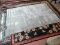 ESTATE OWNED HANDMADE GRAY AREA RUG. MADE IN INDIA. MEASURES APPROXIMATELY 6 FT 3 IN X 9 FT 9 IN.