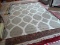 MODERN MACHINE MADE BEIGE AND WHITE AREA RUG FROM CRATE & BARREL. MEASURES APPROXIMATELY 11 FT 8 IN
