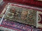 MACHINE MADE COURISTAN ORIENTAL STYLE RUG IN BLUE, IVORY, AND BEIGE WITH FLOWERS AND ANIMALS.