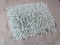 MINT GREEN AREA RUG. MEASURES APPROXIMATELY 2 FT 1 IN X 2 FT 9 IN. ITEM IS SOLD AS IS WHERE IS WITH