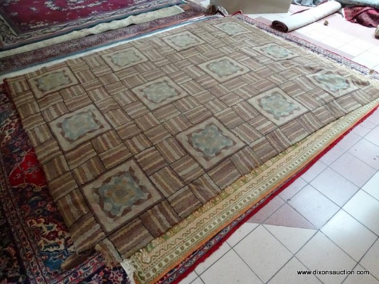 VINTAGE HOOK RUG WITH SOME DAMAGE. MEASURES APPROXIMATELY 8 FT 8 IN X 11 FT 3 IN. ITEM IS SOLD AS IS