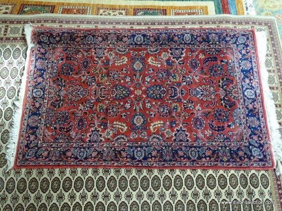 HANDMADE TIGHTLY WOVEN BOKHARA IN MAUVE, BLUE, AND IVORY. MEASURES APPROXIMATELY 3 FT 1 IN X 5 FT 2