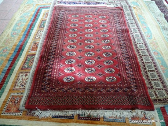 HAND KNOTTED SILKY BOKHARA IN MAROON, IVORY, AND BLUE. MEASURES APPROXIMATELY 4 FT 2 IN X 5 FT 6 IN.