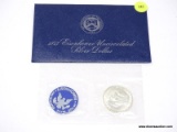 1973 Eisenhower Silver Dollar - blue envelope