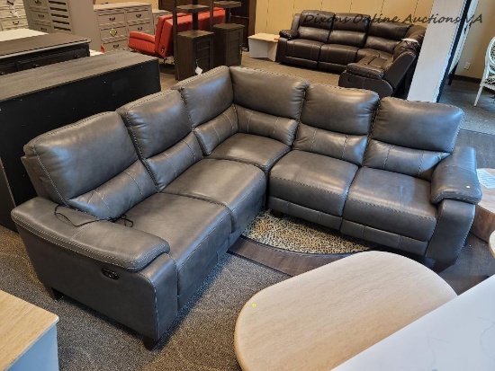 (R3) LEATHER ELECTRIC RECLINING SECTIONAL SOFA IN GRAY. SIMILAR ITEMS RETAIL FOR $3,499 ONLINE!