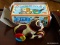 (BD2) VINTAGE METAL PUSH AND GO DOG IN ORIGINAL BOX- 6 IN L. ITEM IS SOLD AS IS WHERE IS WITH NO