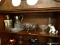 (DR) SHELF LOT OF GLASS- LARGE PRESSED GLASS FRUIT COMPOTE, WATER PITCHER WITH SILVERPLATE TOP, BUD