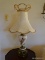 (LR) PR OF CAPODIMONTE LAMPS WITH BRASS BASS WITH DOLPHIN FEET, HAS FANCY VINTAGE SILK SHADES- 34 IN