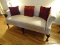 (LR) CHERRY QUEEN ANNE CAMEL BACK SOFA WITH IVORY DAMASK PRINT UPHOLSTERY, NO SIGHTED STAINS OR