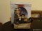(LR) HAND PAINTED PORCELAIN WILLIE THE HOBO MUSIC BOX IN ORIGINAL BOX- 8 IN X 5 IN X 10 IN, ITEM IS