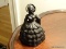 (LR) CAST IRON SOUTHERN BELLE DOORSTOP- 5 IN H, ITEM IS SOLD AS IS WHERE IS WITH NO GUARANTEES OR