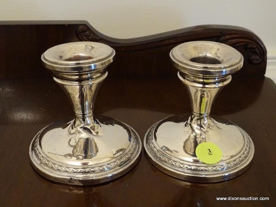 (DR) PR OF STERLING SILVER WEIGHTED CANDLE HOLDERS- 4 IN H,ITEM IS SOLD AS IS WHERE IS WITH NO