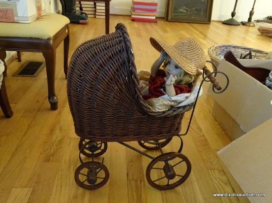 (LR) WICKER DOLL CARRIAGE WITH ANTIQUE COMPOSITION DOLL WITH MOVEABLE ARMS AND LEGS- CARRIAGE- 14 IN