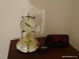 (MBD) 2 CLOCKS- ELECTRIC RADIO SHACK CLOCK AND AN ELGIN QUARTZ BRASS ANNIVERSARY CLOCK IN GLASS