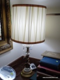 (MBATH) BRASS AND GLASS CUPID LAMP WITH CLOTH SHADE- 29 IN H, ITEM IS SOLD AS IS WHERE IS WITH NO