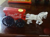 (BD2) CAST IRON COKE WAGON, 7 IN, ITEM IS SOLD AS IS WHERE IS WITH NO GUARANTEES OR WARRANTY. NO