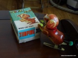 (BD2) VINTAGE JUMPING DOG IN ORIGINAL BOX, 5 IN H, ITEM IS SOLD AS IS WHERE IS WITH NO GUARANTEES OR